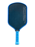 A pickleball paddle with a dark blue textured face, a bright blue border, and a blue wrapped handle, featuring the J2CR logo vertically on the right side.